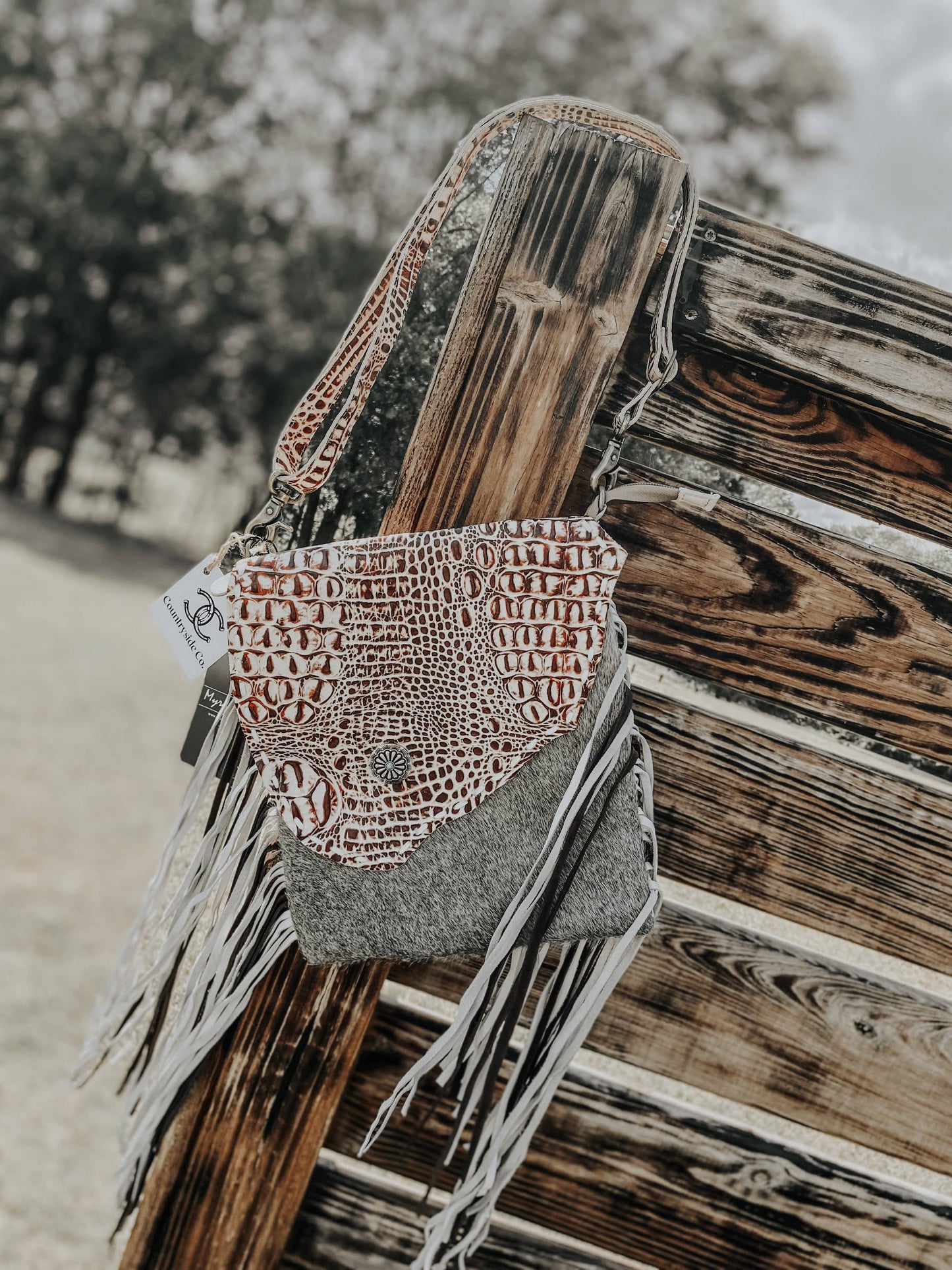 Myra Cowhide Fringe Bag