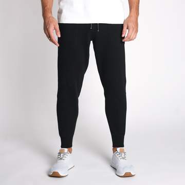 We take pride in the process. The Mills Unisex Jogger is made from a premium heavyweight french terry fleece, slow knitted to achieve the highest quality and durability. We construct the mills with flatlock stitching for elevated construction quality that will stand the test of time. This slim fit unisex jogger has two patch front pockets a ribbed crotch gusset and is finished off with premium details and high quality trims.
