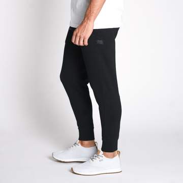 We take pride in the process. The Mills Unisex Jogger is made from a premium heavyweight french terry fleece, slow knitted to achieve the highest quality and durability. We construct the mills with flatlock stitching for elevated construction quality that will stand the test of time. This slim fit unisex jogger has two patch front pockets a ribbed crotch gusset and is finished off with premium details and high quality trims.