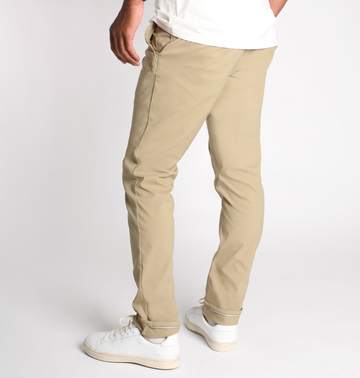 We designed this tailored technical pant with all situations in mind. We wanted a pant that could be worn to the office, the golf course, on a hike, traveling, bike ride and a skate session. Whatever your need, the liberty is built to perform and look sharp along the way. We designed the liberty with a cotton-like Nylon/Spandex material that is highly breathable, super stretchy, lightweight and DWR coated for water/stain protection. 