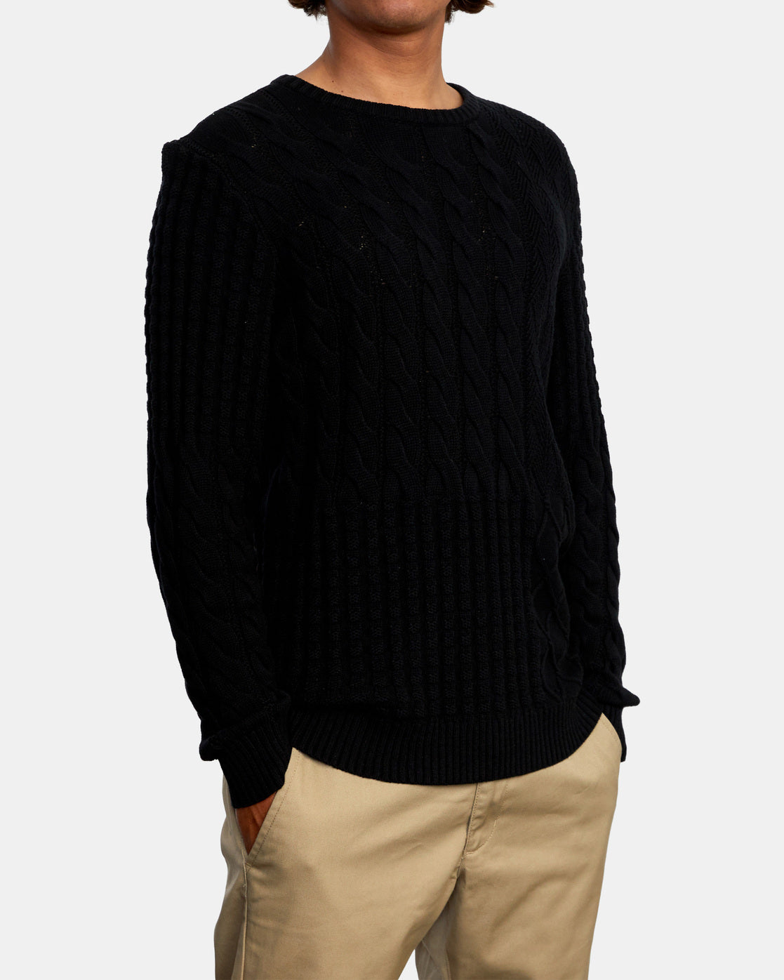 Look sharp in the RVCA Desmond Crewneck Sweater, made from cotton cable knit fabric in a mid-weight feel that keeps you warm in style. Featuring a crew neck with long sleeves, this men's pullover sweater is built with a ribbed collar, cuffs and hem for a classic look. Finished off with our signature RVCA solo label at the hem.