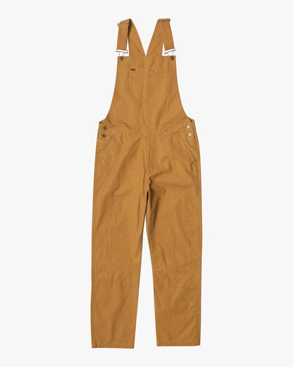 Men's cotton overalls from RVCA with open top tack buttons and adjustable suspenders and waistband. 